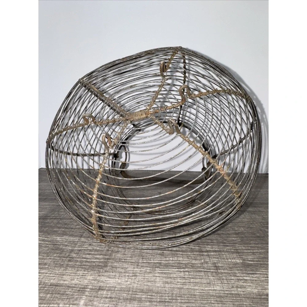 Antique French Wire Egg Basket with coil covered handle and  legs. Farm